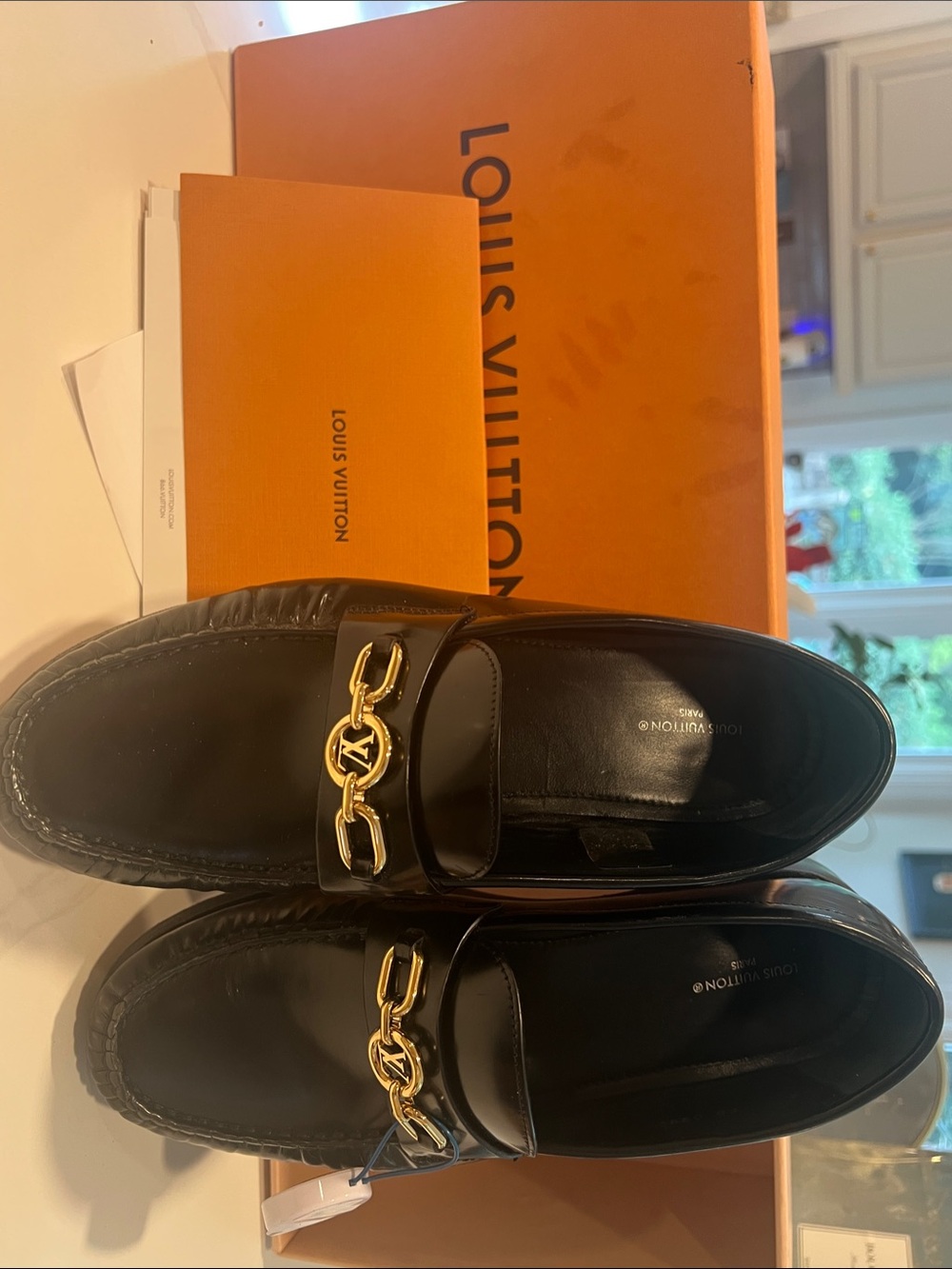 Louis Vuitton Black Leather Slip-On Loafers with Gold Chain Emblem